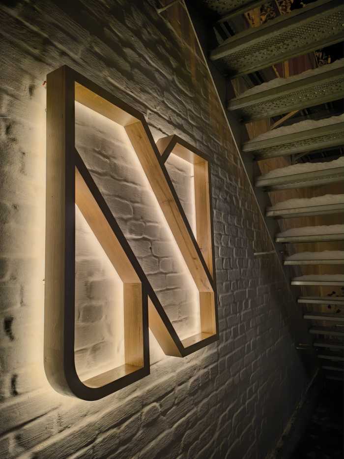 Enseigne extérieure lumineuse pour commerce